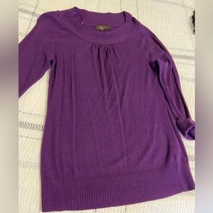 Scooped neck with 3/4 length cuffed sleeve